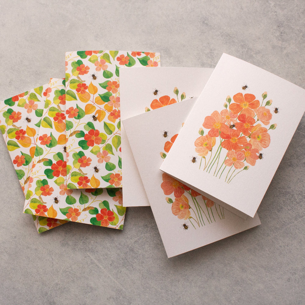 Set of floral greeting cards on a grey surface