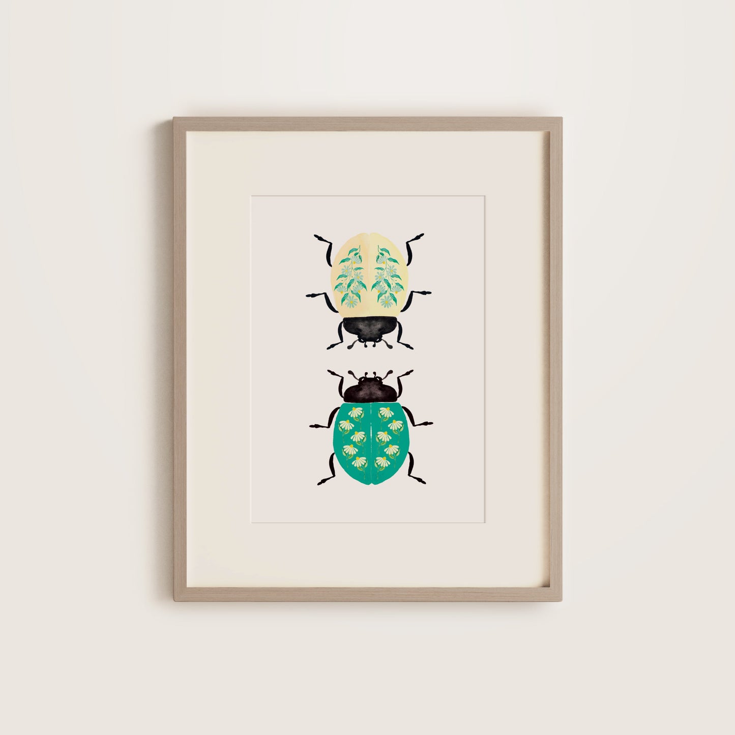 Framed artwork of two illustrated beetles on a white background