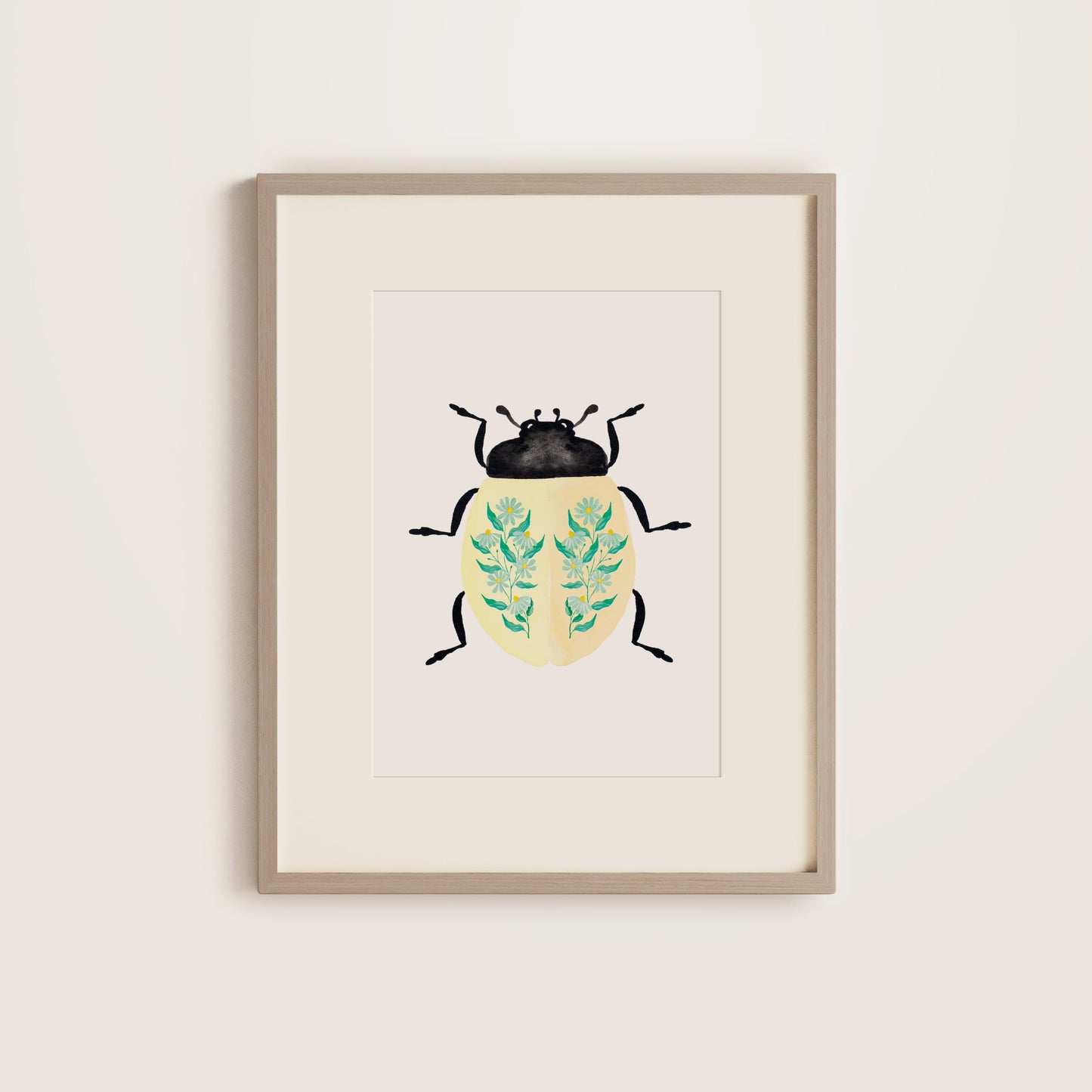 Cream lady beetle art print with teal daisies on its back, framed botanical illustration