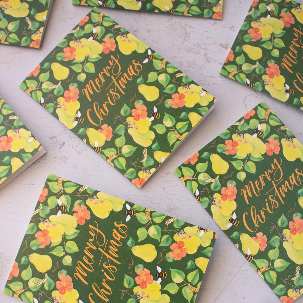 Floral holiday greeting card with a Christmas pear illustration