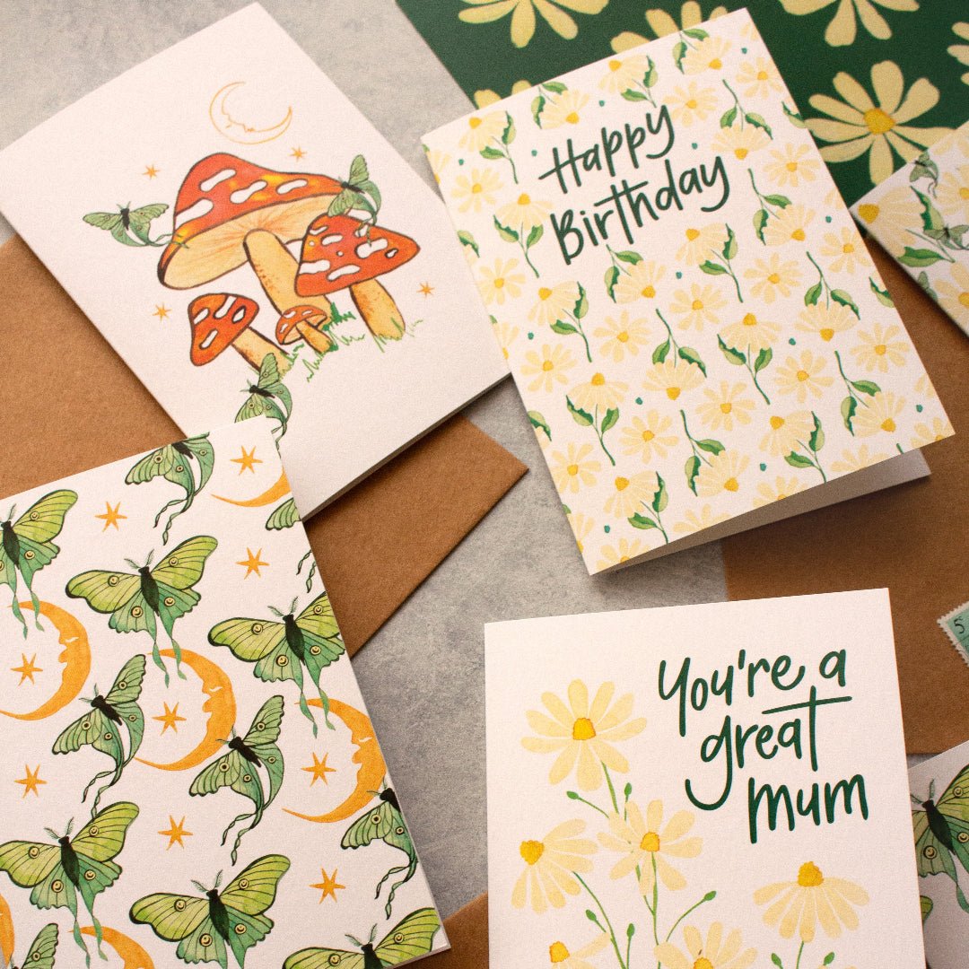 Assorted botanical greeting cards showcasing vibrant floral patterns and nature-inspired artwork, printed on high-quality card stock.