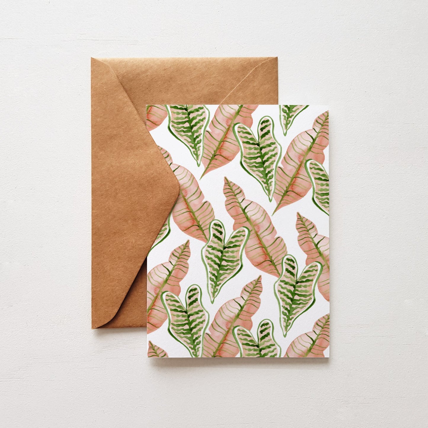 pink and green leaves card with brown envelope