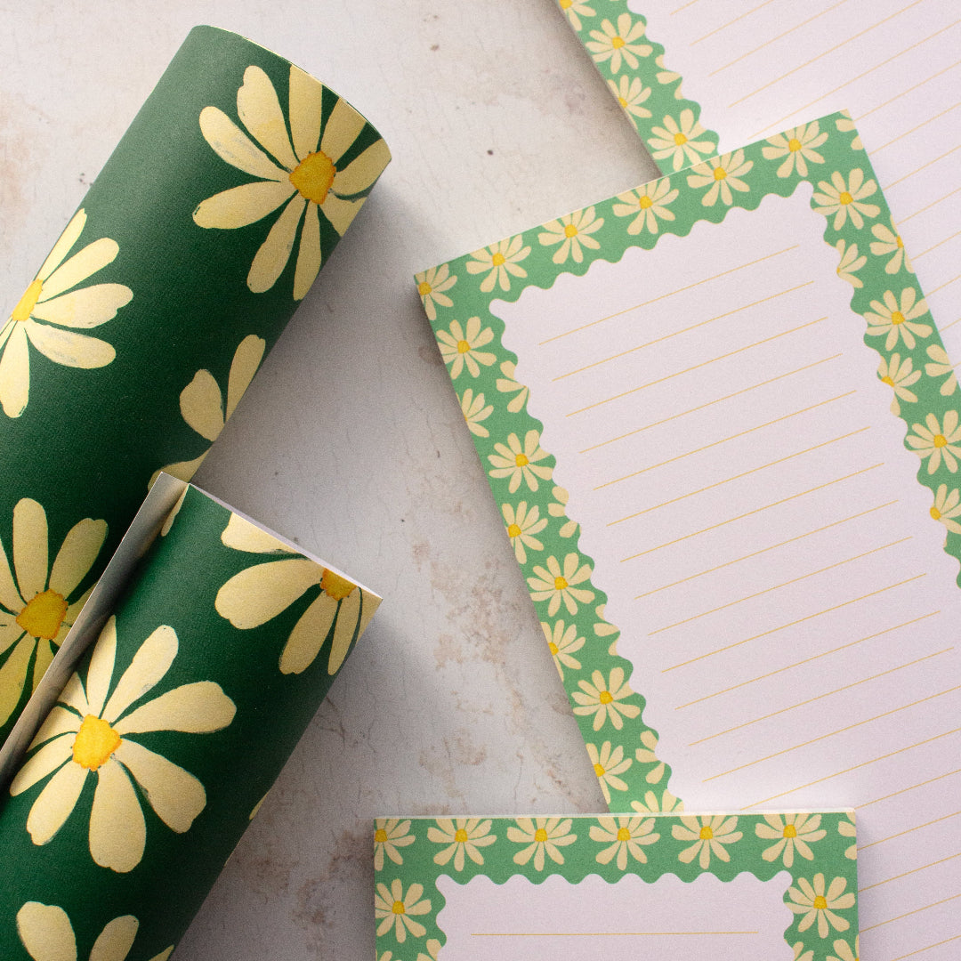 Floral teal DL notepads with daisies and lines, featuring matching wrapping paper for a beautiful stationery set.