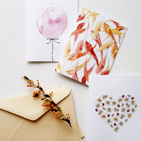 Various greeting cards and envelopes