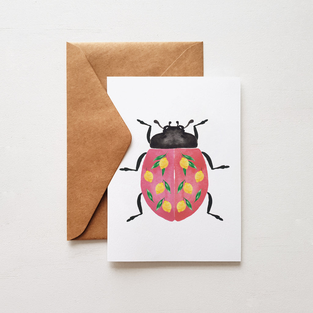 kraft envelope pink lady bug and lemons greeting card