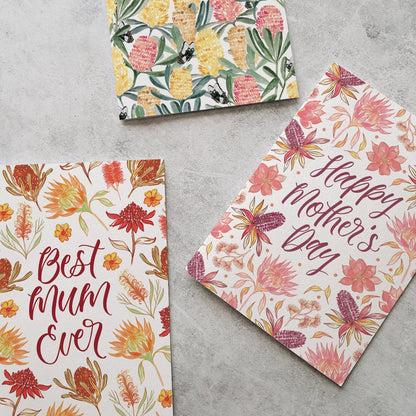 Colourful mother's day greeting cards with flower designs on a grey background