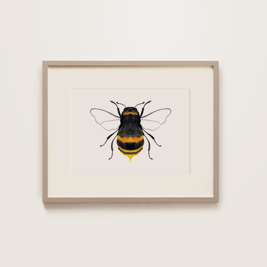 A watercolour print of a black bumble bee with yellow accents, wooden frame.