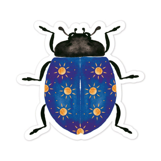 Sticker of a blue beetle with yellow sun patterns on a white background