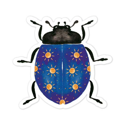 Sticker of a blue beetle with yellow sun patterns on a white background
