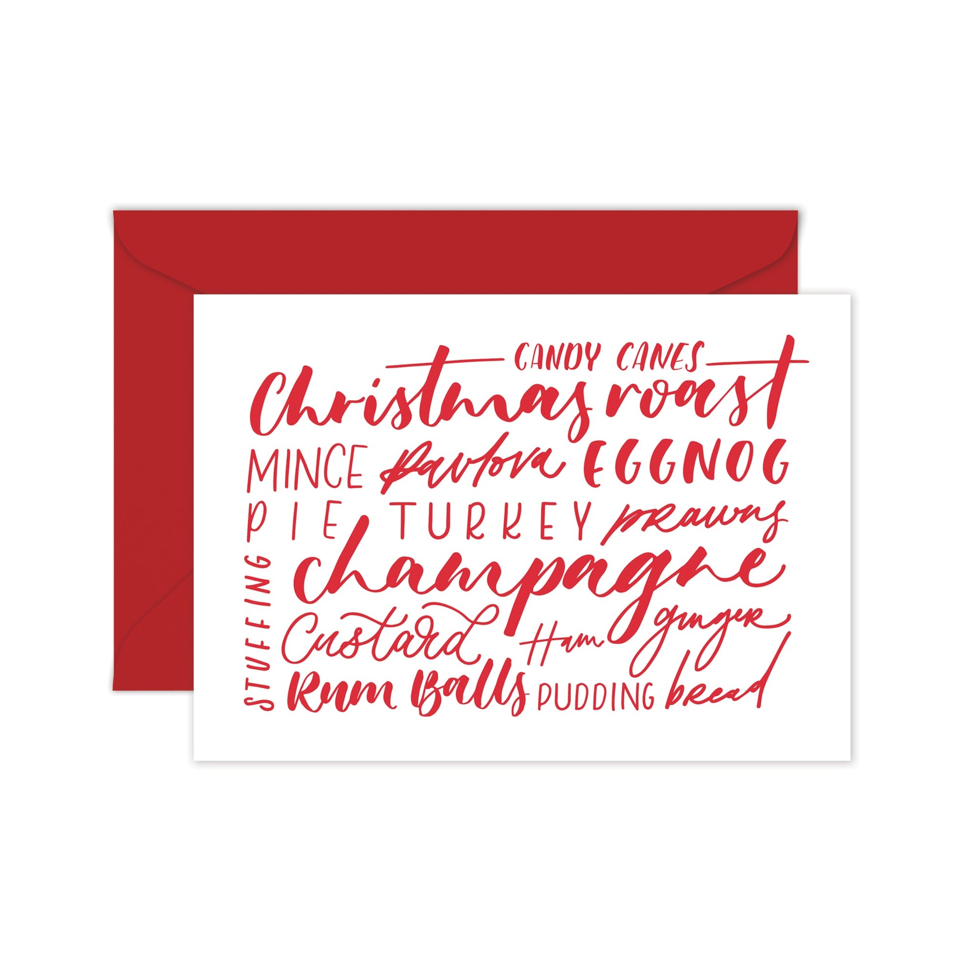 A folded white greeting card with red text, listing various Christmas-related phrases, and a red envelope. 