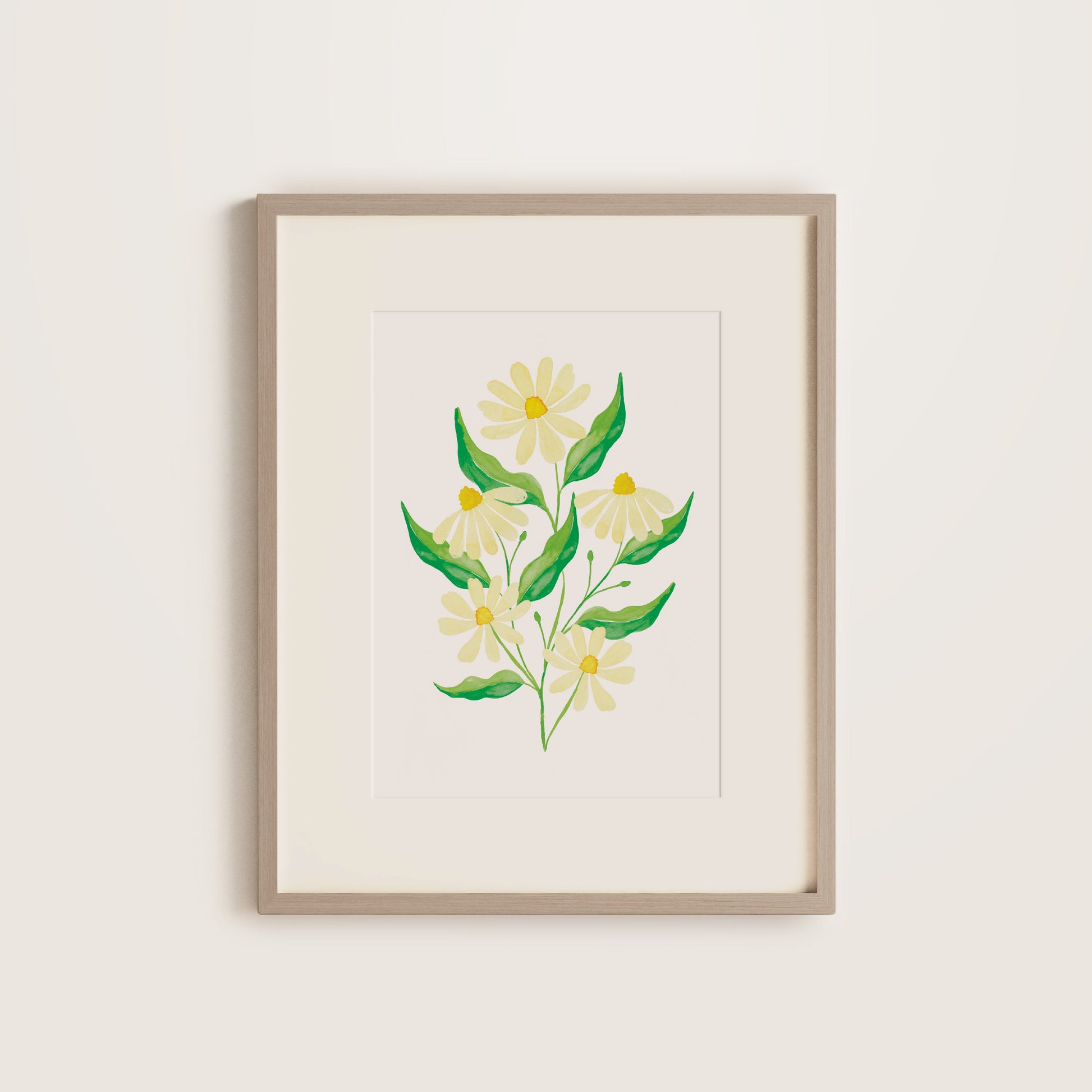 Framed print with cream daisies and green leaves in a wooden frame