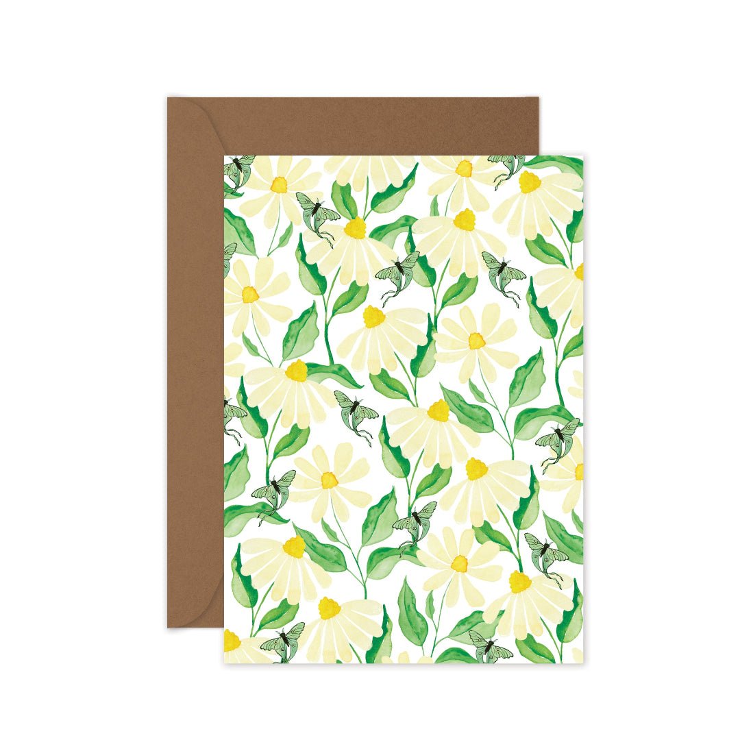 Everyday greeting card with a whimsical pattern of daisies and luna moths, kraft envelope