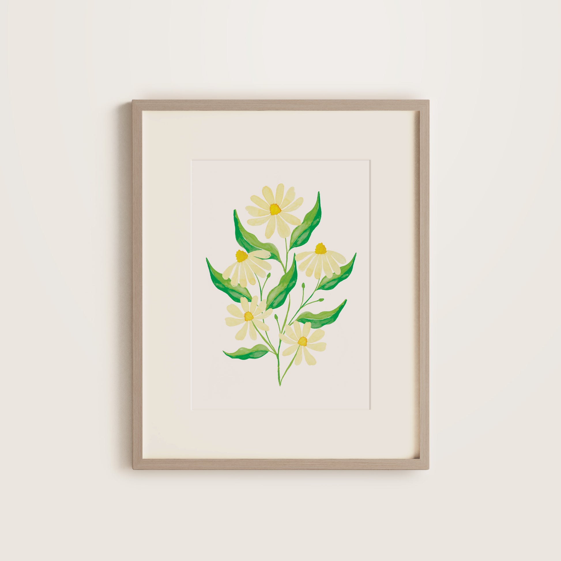 Framed print with cream daisies and green leaves in a wooden frame
