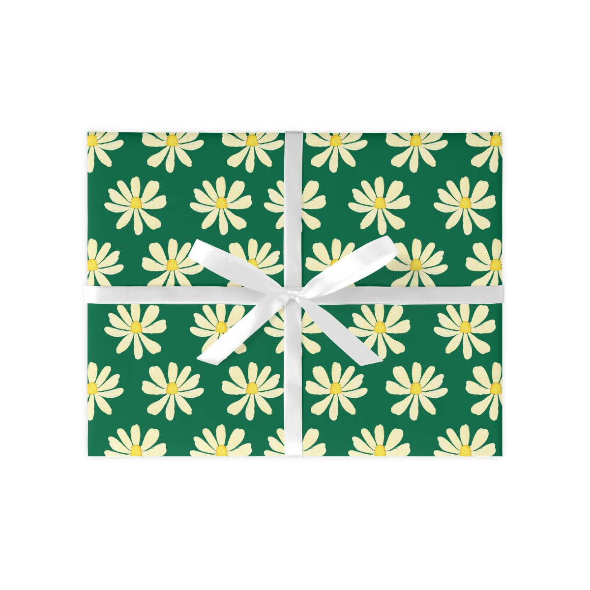 A sheet of wrapping paper with a green background and white daisy patterns, tied with a white ribbon.