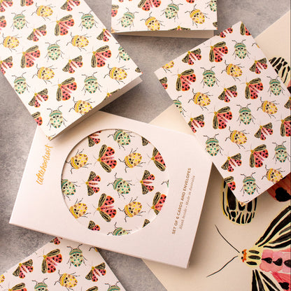 Botanical everyday card set featuring flowers, beetles and moths in soft tones