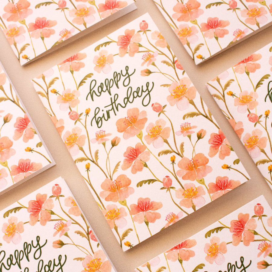 Set of floral birthday cards with 'Happy Birthday' text on a matching background.