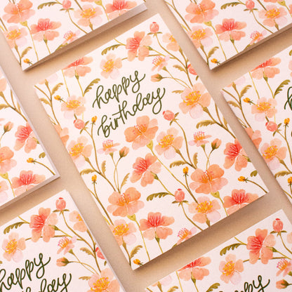 Set of floral birthday cards with 'Happy Birthday' text on a matching background.
