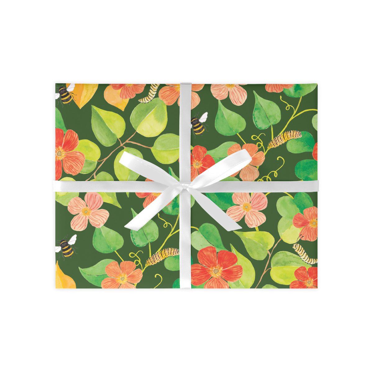 Gift box with floral pattern and white ribbon on a white background