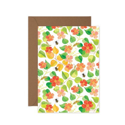 Blank flower card for any occasion with floral pattern and brown envelope on white background