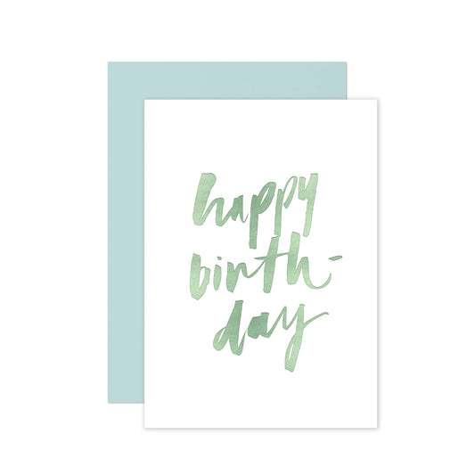 Hand-lettered happy birthday greeting card with mint foil accents and a matching mint envelope