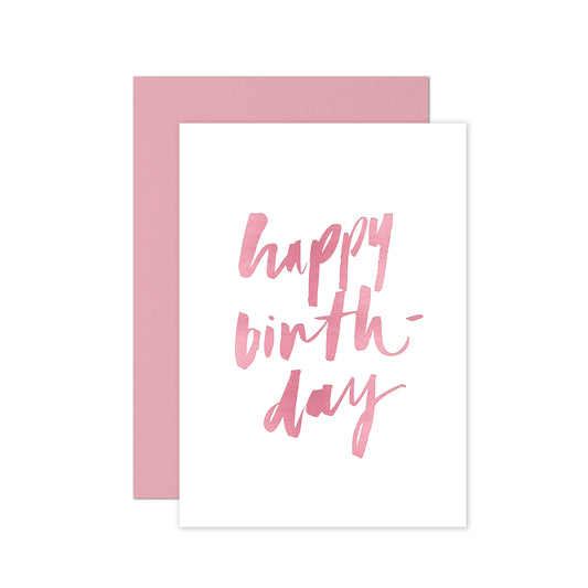 Hand-lettered happy birthday card with pink foil details and a matching pink envelope