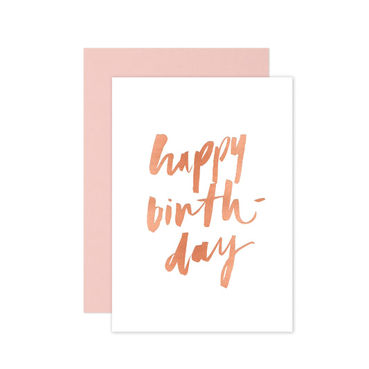 Hand-lettered happy birthday greeting card with rose gold foil details and a blush pink envelope