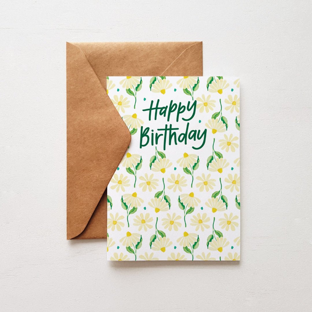 Certified Australian Made Happy Birthday greeting card featuring delicate daisies with a kraft envelope. A charming floral design, perfect for special occasions.