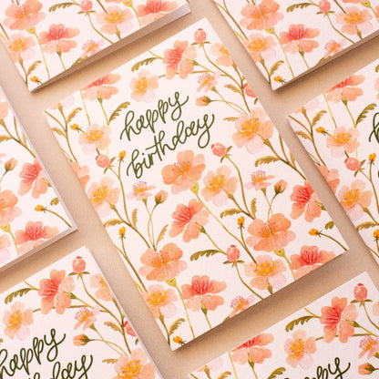Set of floral birthday cards with 'Happy Birthday' text on a matching background.