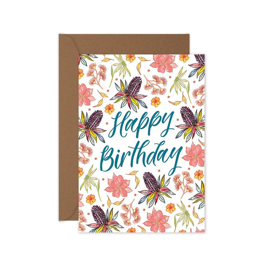 Floral birthday card with 'Happy Birthday' text and brown envelope on white background