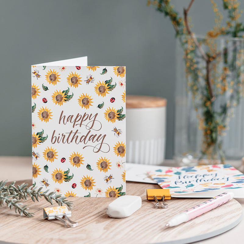Sunflower birthday greeting card displayed in a home setting 