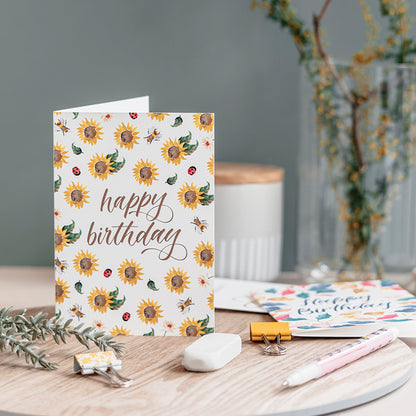 Sunflower birthday greeting card displayed in a home setting 