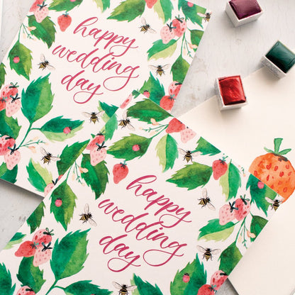 Floral design with 'happy wedding day' text on a white background