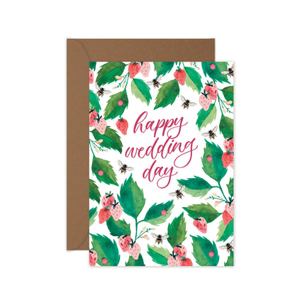 Greeting card with floral design and 'happy wedding day' text on a white background