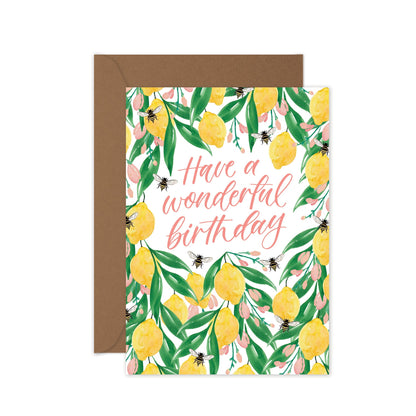 Greeting card with lemon design and 'Have a wonderful birthday' text, featuring a brown envelope.