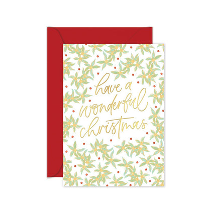 Christmas card with floral pattern and 'have a wonderful Christmas' text, red envelope.