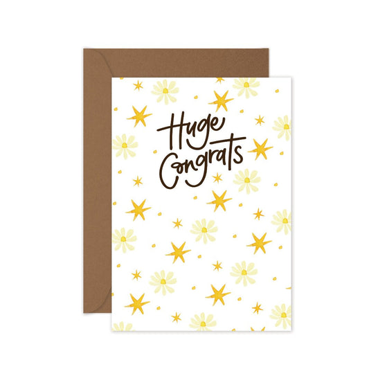 Huge Congrats greeting card featuring delicate daisies and yellow stars, paired with a kraft envelope.