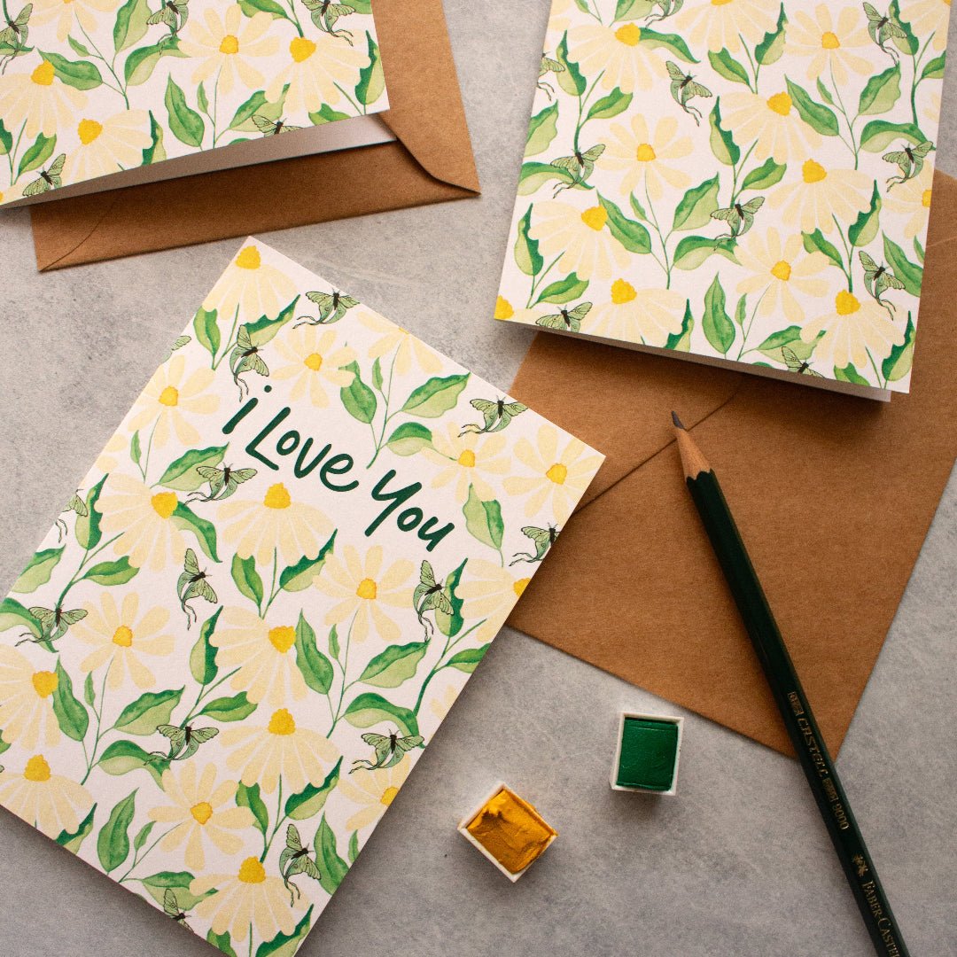 Romantic greeting card featuring hand-drawn daisies and 'I Love You' text, ideal for anniversaries and Valentine's Day.