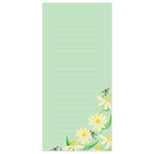 Notepad with floral design on a light green background