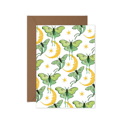 Everyday greeting card with kraft envelope. Card design repeat pattern of green luna moths and yellow crescent moons.