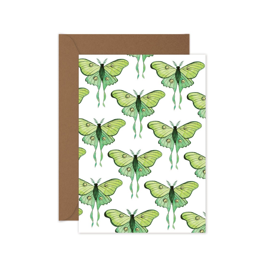 Teal luna moths pattern card and a kraft envelope.