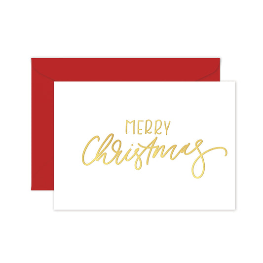 Greeting card with 'Merry Christmas' written in gold foil on a white background, with a red envelope.