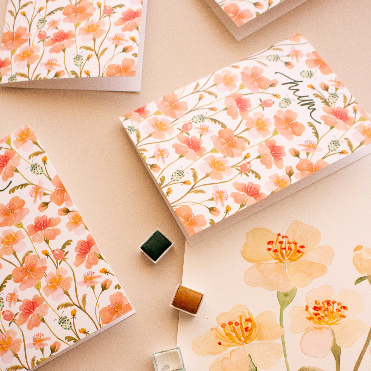 Floral Mother’s Day greeting card with pink flowers and teal beetles on white background