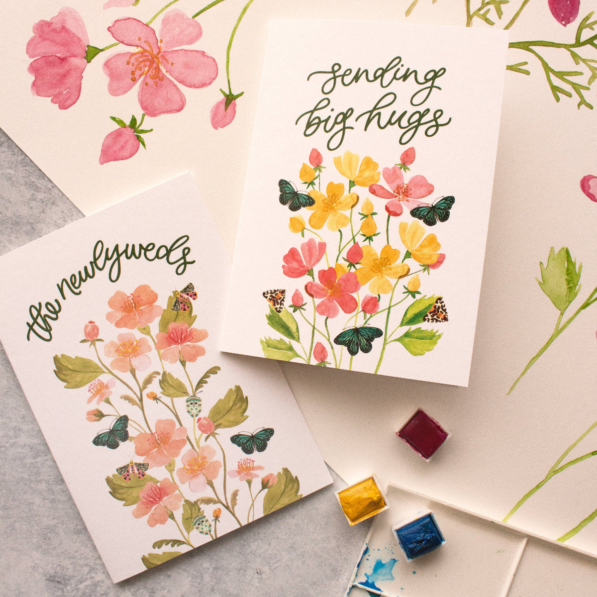 Elegant wedding stationery featuring floral watercolour newlyweds card