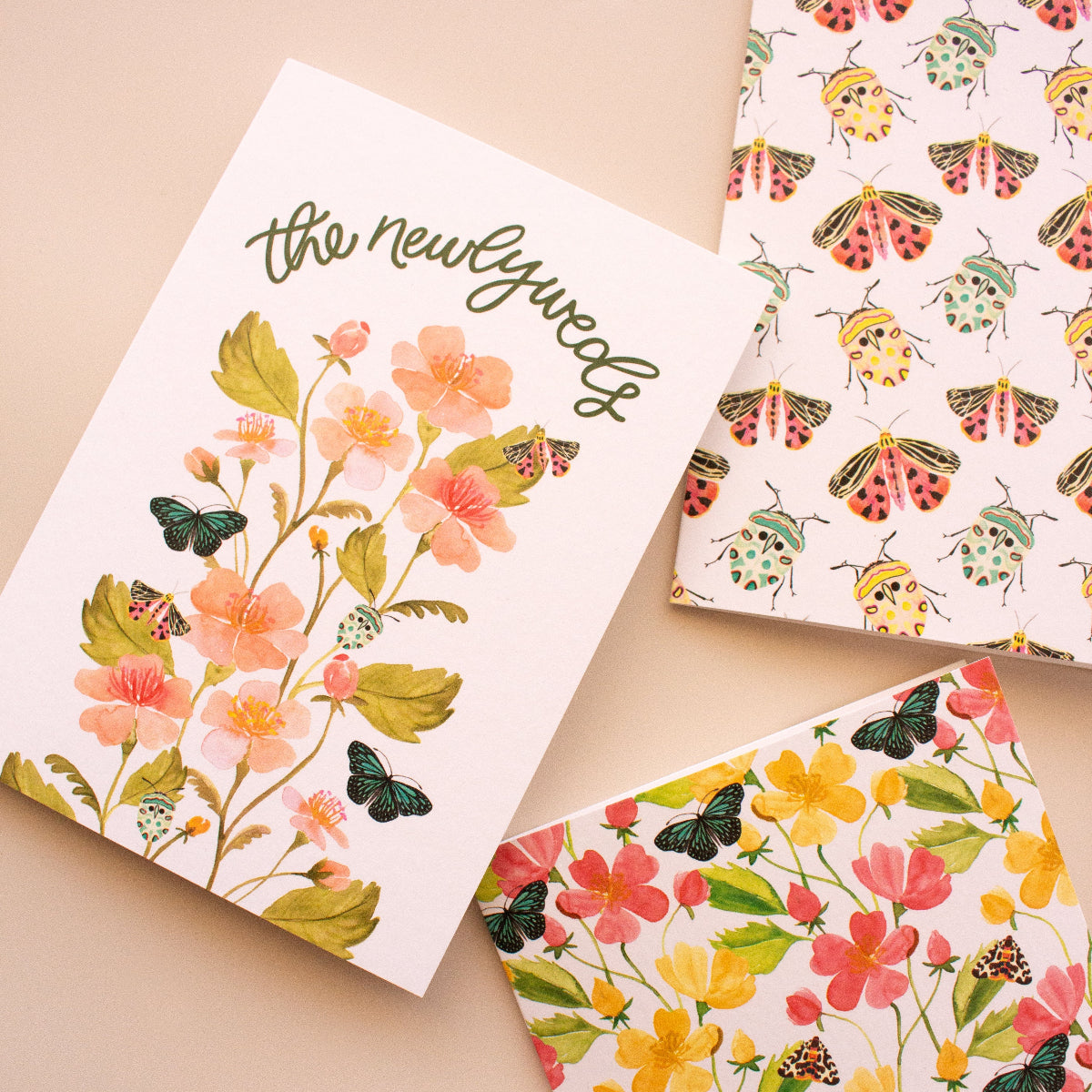 Romantic newlyweds wedding greeting card with pastel watercolour blooms and greenery