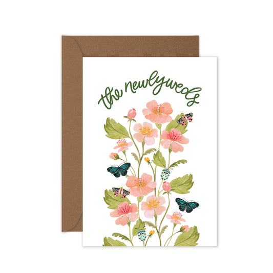Handmade wedding greeting card for newlyweds with watercolour floral artwork and envelope.