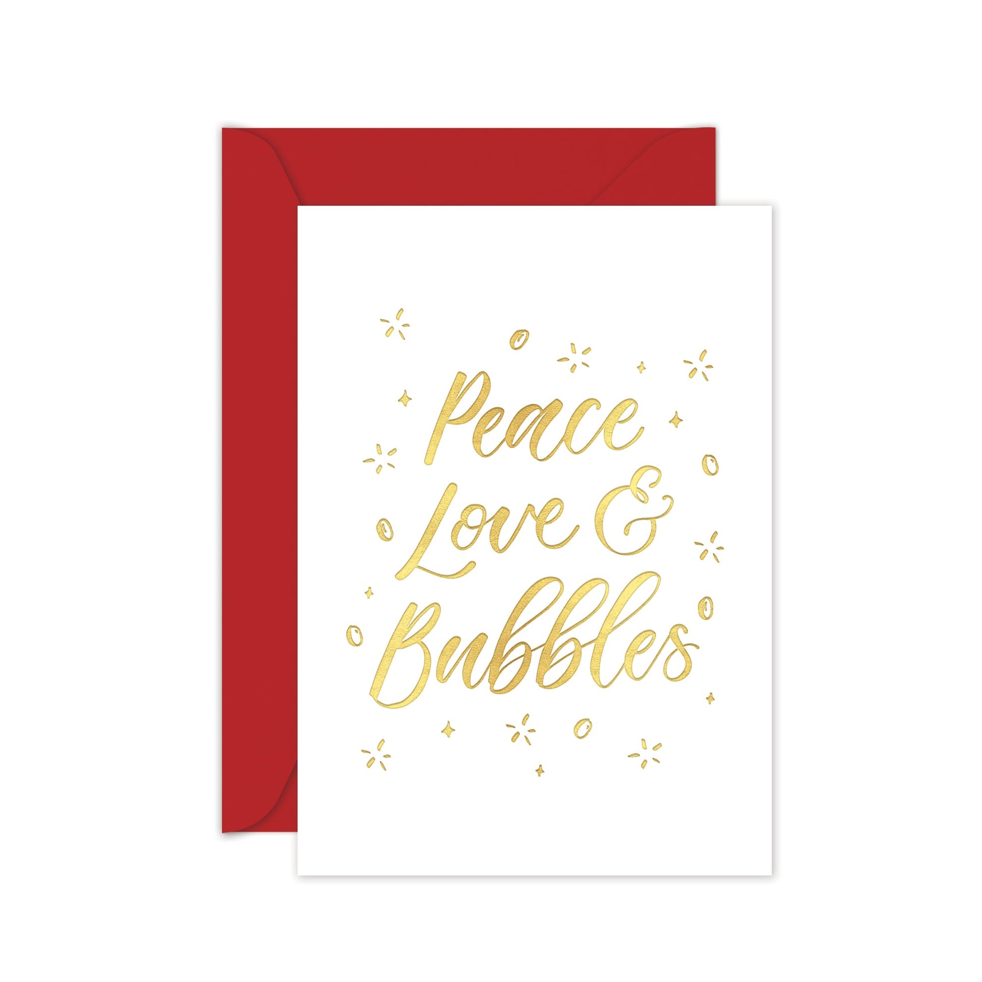 A greeting card with 'PEACE, LOVE & BUBBLES' written in gold foil on a white background, accompanied by a red envelope.