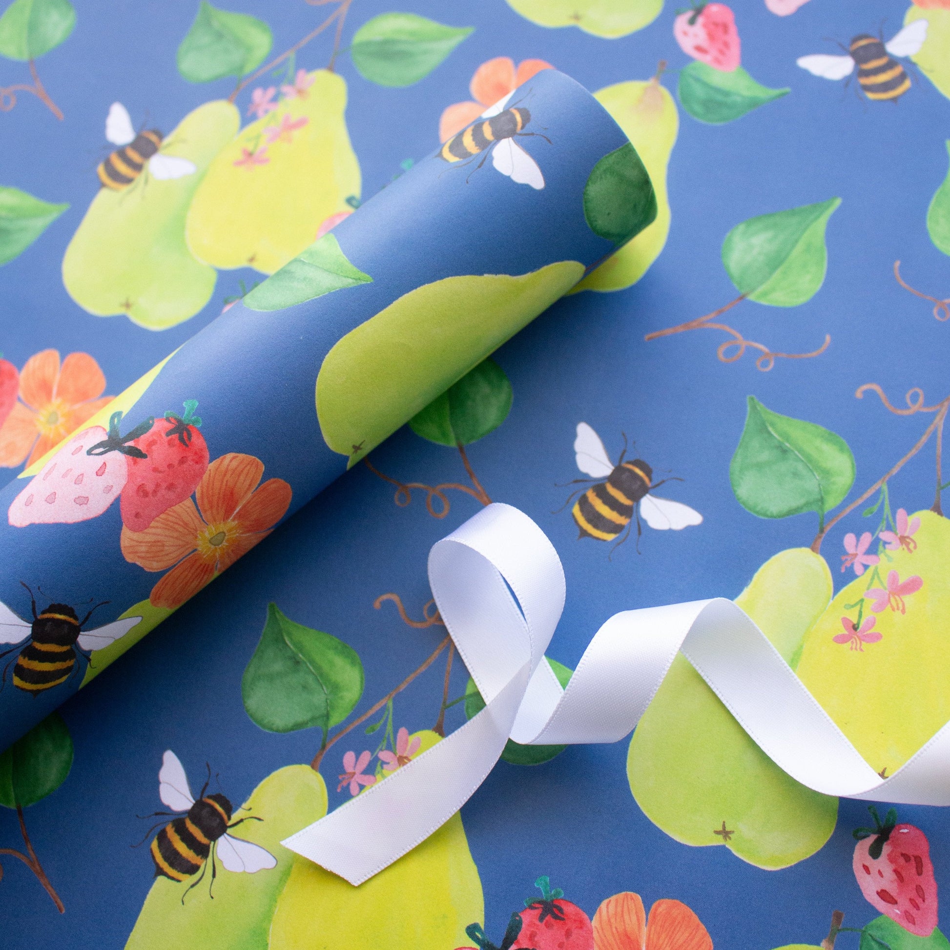 wrapping paper roll with white ribbon