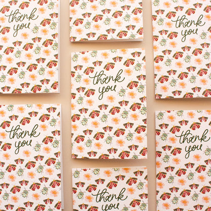 Set of 'thank you' greeting cards featuring flowers, beetles and moths