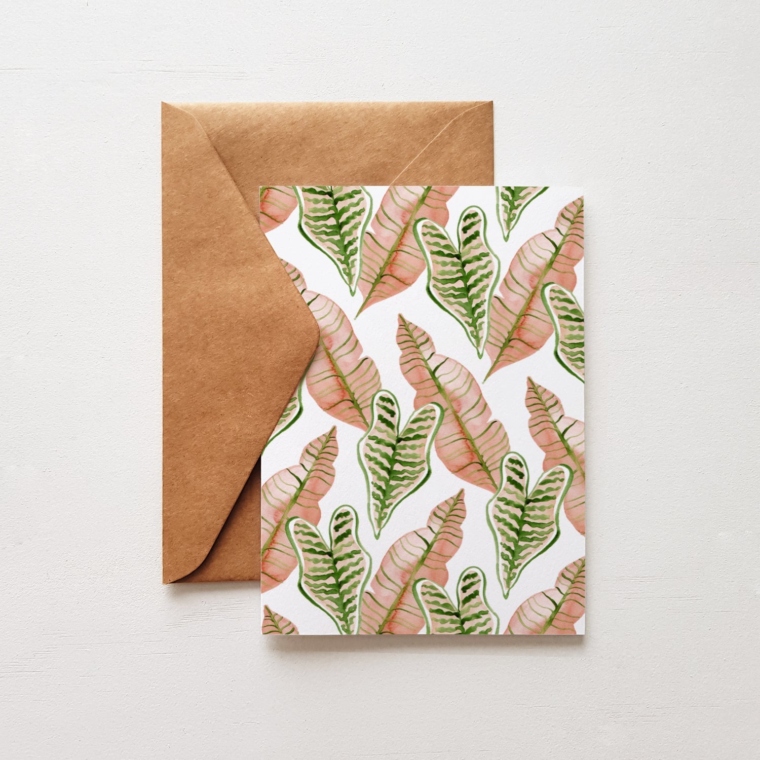 pink and green leaves card with brown envelope