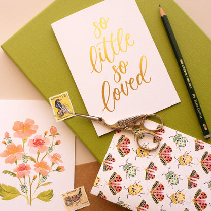 New baby card with gold foil design and kraft envelope